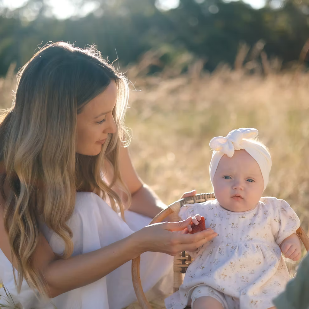 Parent supporting child during calm blood test experience