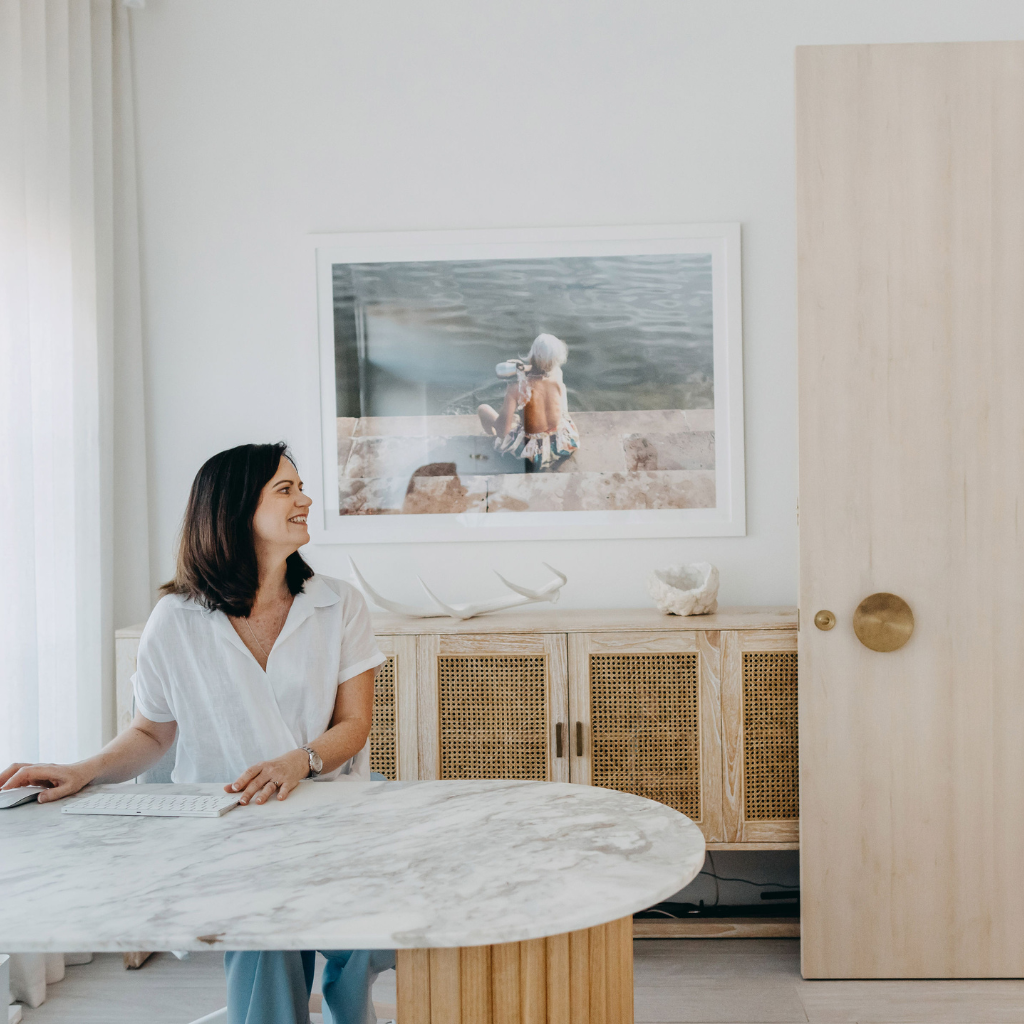 Naturopath showing a diagram of progesterone and hormone support for fertility and implantation